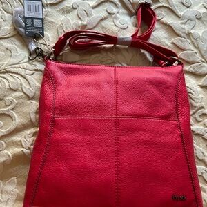 The Sak Lucia Magenta Crossbody Bag with Adjustable Strap and Minimalist Design